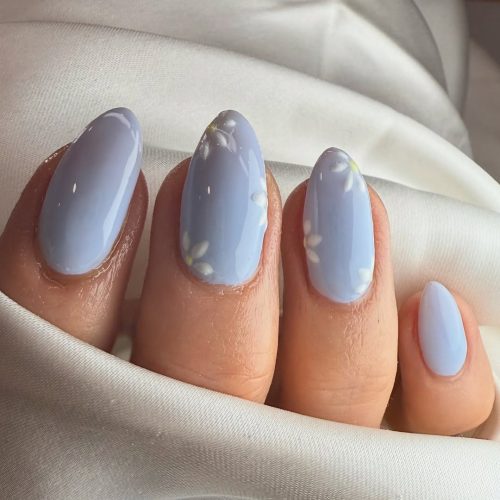11-Soft Blue Nails with Delicate Floral Accents